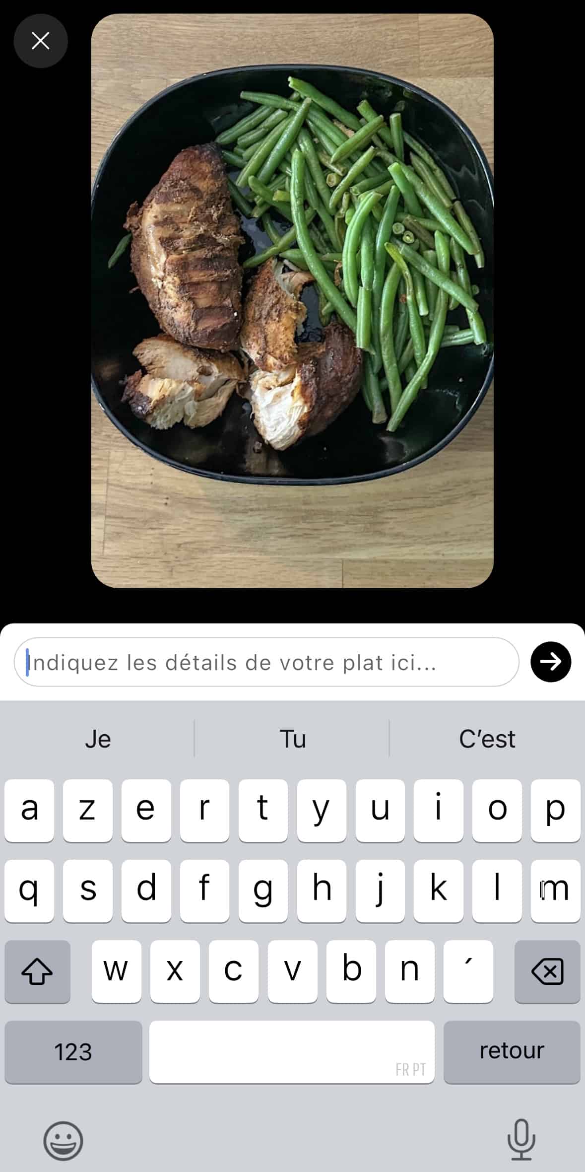 Interface du scan IA de l'application Lean, avec une photo d'un plat de poulet et haricots verts prête pour l'analyse nutritionnelle.